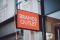 Brands outlet sign on city street. Signboard of modern cloth store, shop, mall, boutique. Display in mall. Kiev, Ukraine -