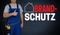 Brandschutz in german Fire safety concept and craftsman with t