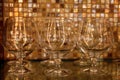 Brandy glasses against restaurant bar background Royalty Free Stock Photo