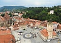 Brashov historical centre and famous square with city tower and gothic cathedral Royalty Free Stock Photo