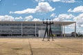 Candangos or Warriors Sculpture at Three Powers Plaza with Planalto Palace on background - Brasilia, Distrito Federal, Brazil Royalty Free Stock Photo