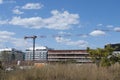 A Large crane being used for the construction of a new apartment building