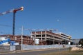 A Large crane being used for the construction of a new apartment building