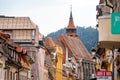 Brasov Republicii street and Council square in the evening during spring season . The most important street and sqaure in the