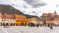 Brasov Republicii street and Council square in the evening during spring season . The most important street and sqaure in the