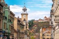 Brasov Republicii street and Council square in the evening during spring season . The most important street and sqaure in the