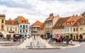 Brasov Republicii street and Council square in the evening during spring season . The most important street and sqaure in the