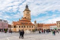 Brasov Republicii street and Council square in the evening during spring season . The most important street and sqaure in the