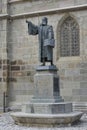 Statue of Johannes Honterus by Harro Magnussen outside the Black Church in Brasov Royalty Free Stock Photo