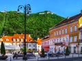 Council Square in Brasov and Mount Tampa with the name of the city on top. Colorful old town in