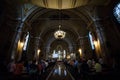 BRASOV, ROMANIA - JULY 30, 2017: People attend mass in Romanian Orthodox Cathedral (Catedrala Ortodoxa Sfanta Adormire a Maicii