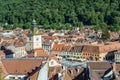 Brasov city hall clock tower located in the old town Council Square. View from above Royalty Free Stock Photo