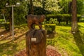 BRASOV, ROMANIA. Wood statue in front of the Faculty of Silviculture and Forest Engineering. Royalty Free Stock Photo