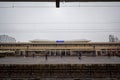 Brasov train station Gara de Brasov seen from its main platform with passengers waiting for an intercity train