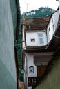Narrow medieval street in the European city of Brasov, Romania. Eastern Europe architecture Royalty Free Stock Photo