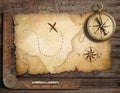 Brass antique nautical compass with old map Royalty Free Stock Photo