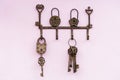 Brass antique skeleton keys hanging on wall