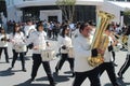 Brass band marching along the street Royalty Free Stock Photo