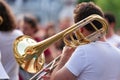 Trombone player on road Royalty Free Stock Photo