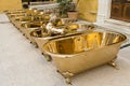 Brass Bathtubs and Statue Royalty Free Stock Photo