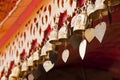 Brass bell on temple corridor ceiling.