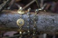 brass bracelets with labradorite stone on wooden background Royalty Free Stock Photo