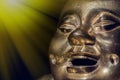 Brass buddha. Happy laughing enlightened monk face Royalty Free Stock Photo