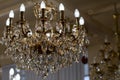 Brass chandelier with crystal.