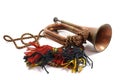 A Brass and Copper Small Bugle Instrument On White Background