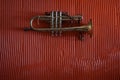 Brass cornet on wall Royalty Free Stock Photo