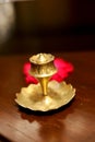 Brass diya with flower