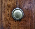 Brass door knob on the old wooden door Royalty Free Stock Photo