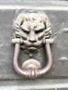 Brass door knocker with lion head Royalty Free Stock Photo