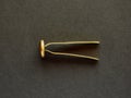 Brass fastener or split pin Royalty Free Stock Photo