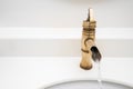 Brass faucet vintage design on wash basin