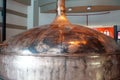 Brass fermentation vessels on display at the South African Brewery