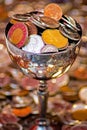 Brass Goblet Filled With Canadian Currency Royalty Free Stock Photo