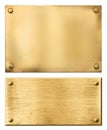 Brass or gold metal plates isolated Royalty Free Stock Photo