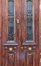 Brass Hardware on Old Brown Wooden Doors Royalty Free Stock Photo