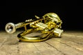 Brass instrument - yellow trumpet on stage with backlight Royalty Free Stock Photo