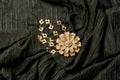 Brass jewelry decoration on black cloth