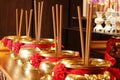 Brass Joss Sticks on tabel Royalty Free Stock Photo
