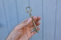 Old vintage brass door Key in mans hand Royalty Free Stock Photo