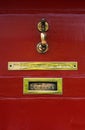 Brass Knocker on red door