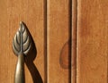 Brass Leaf on Beadboard Royalty Free Stock Photo