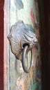 Brass Lion door knock on temple door Royalty Free Stock Photo