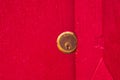 Brass lock on a blood red painted wooden door. Close up. Security, safety, safekeeping concept. Royalty Free Stock Photo