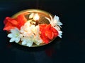 Brass metal plate decorated with jasmine flowers and aroma incense Royalty Free Stock Photo