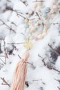 Yantra faceted morganite mala necklace on the white snow