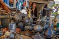 Brass and other metal objects including religious items sold at the flea market in Tel Aviv Royalty Free Stock Photo